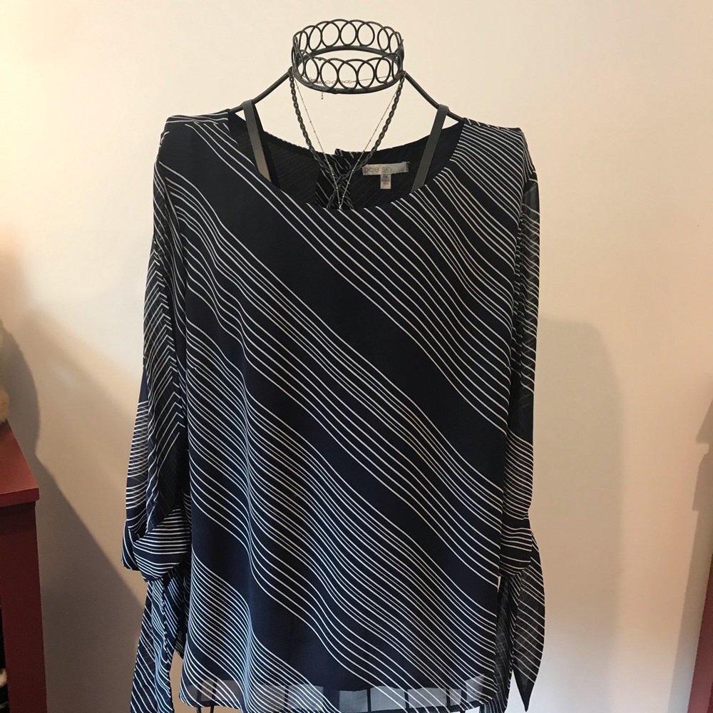 Pale sky Navy top very flattering on